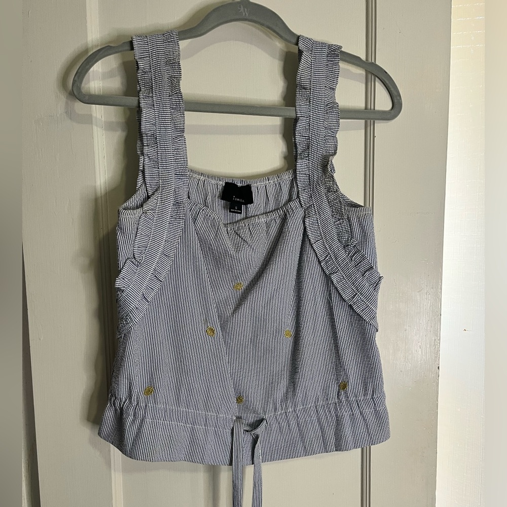 Lumiére tie tank